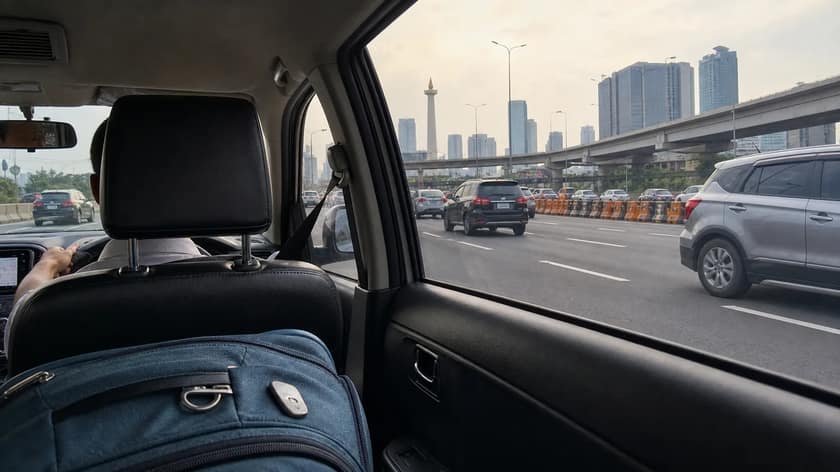 Jakarta city traffic and skyline