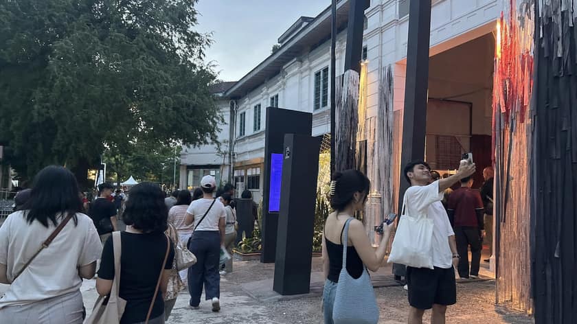 Visitors outside a contemporary art event venue in Yogyakarta