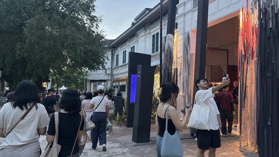 Visitors outside a contemporary art event venue in Yogyakarta