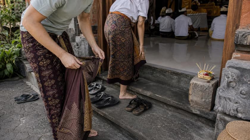 People walking through an Indonesian market street