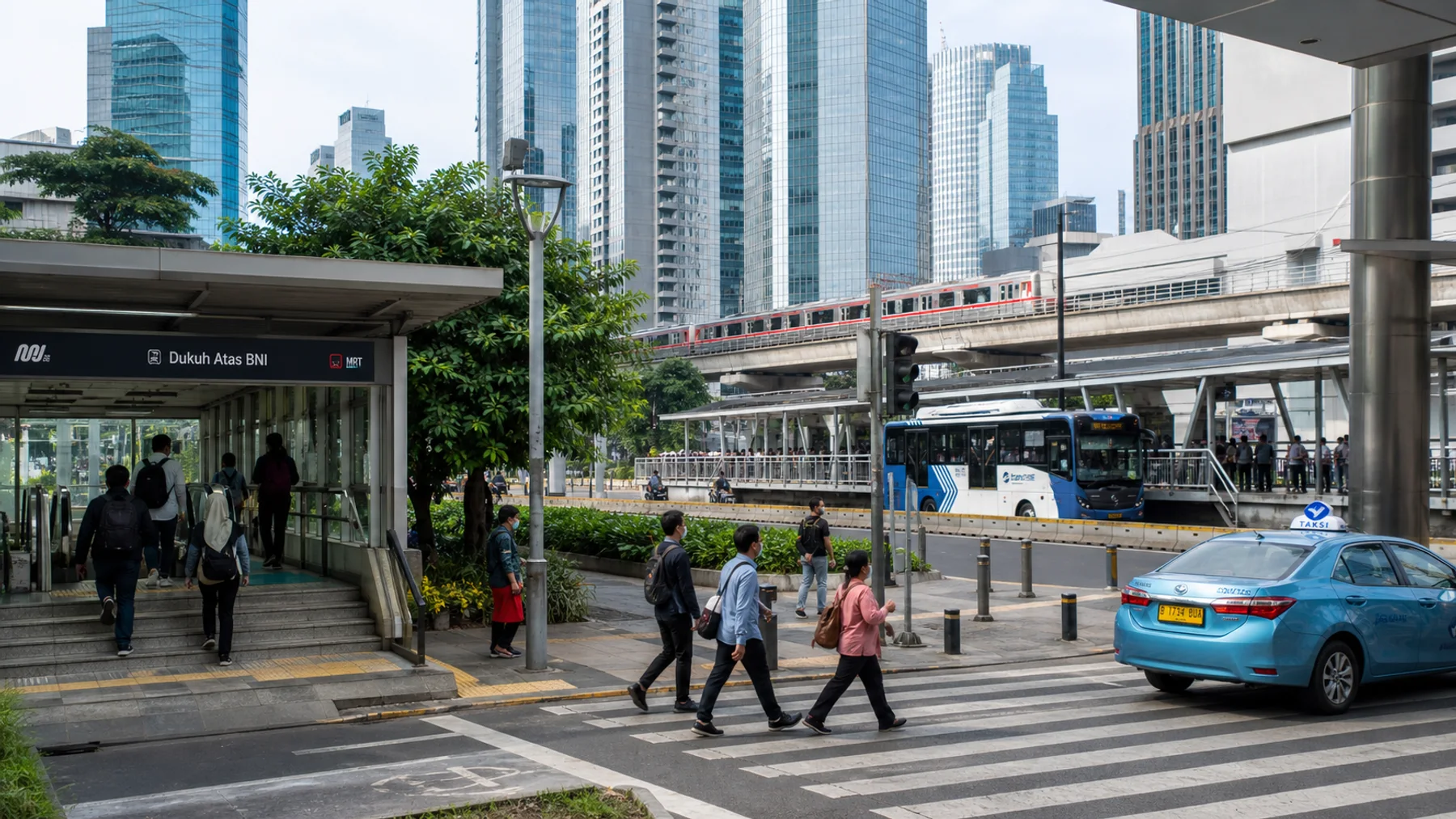 Jakarta MRT entrance with bus corridor, crossing and taxi lane