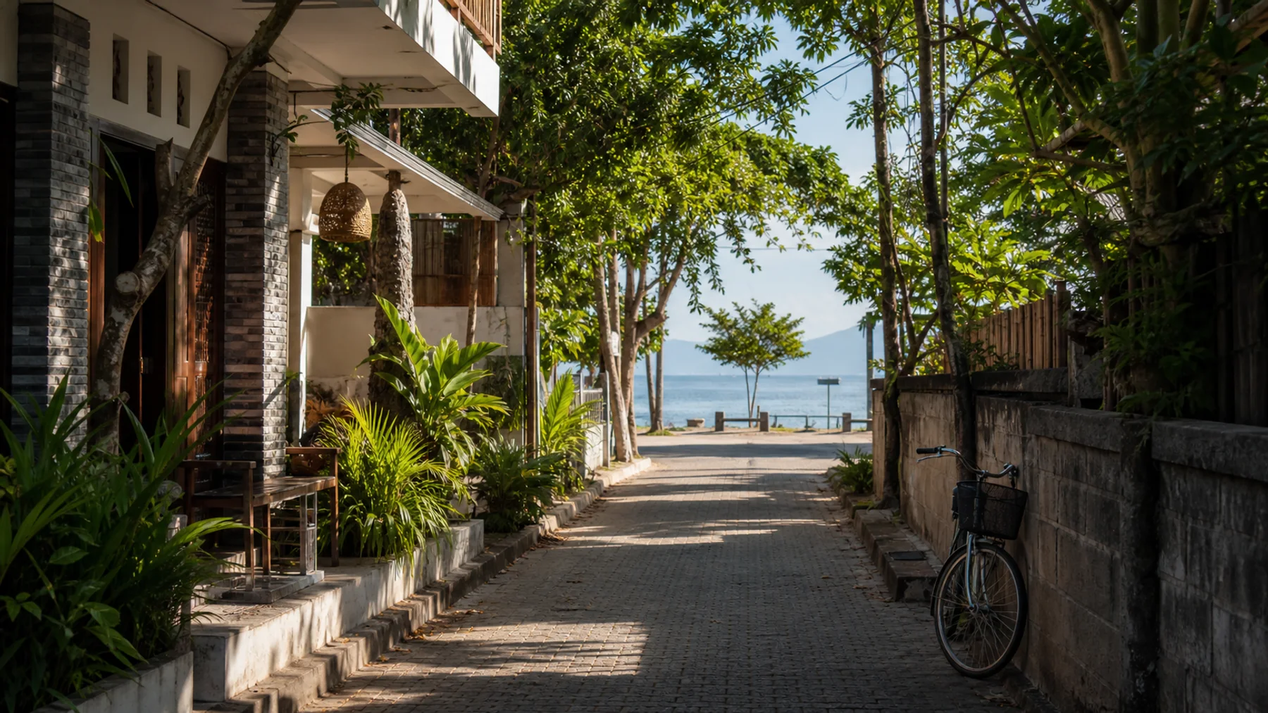 Sanur hotel lane leading toward the beach promenade