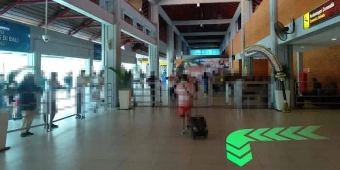 Grab official DPS image showing the domestic motorbike-point route at Bali Airport.