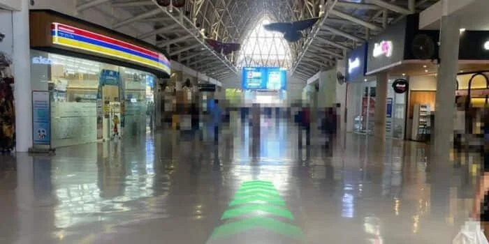 Grab official DPS image showing the domestic corridor route near Indomaret.