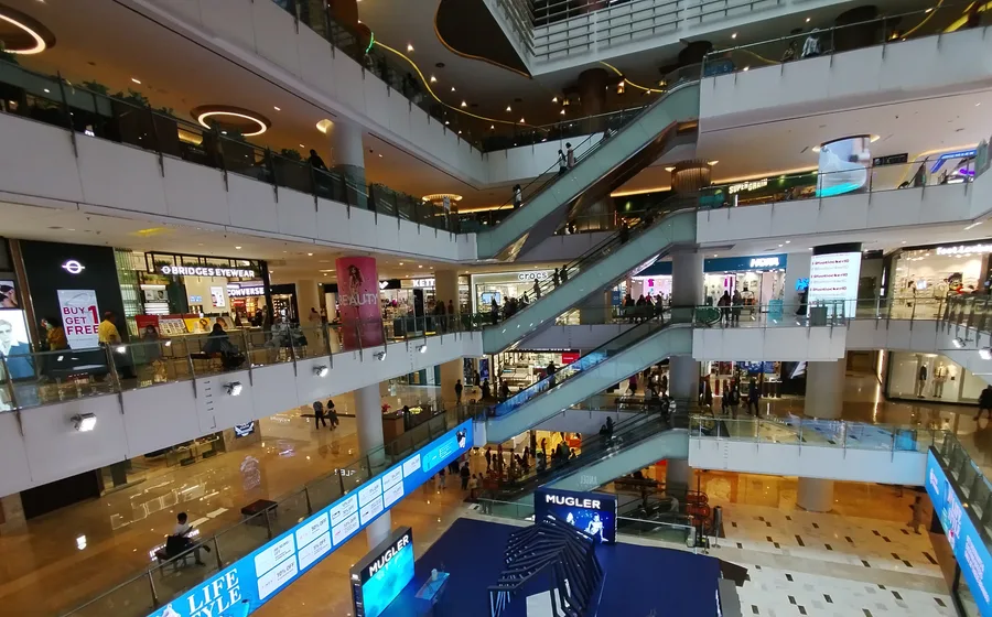 Interior walkways and escalators inside Grand Indonesia mall in Jakarta.