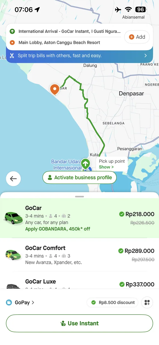 Gojek app quote from Bali Airport to Aston Canggu showing GoCar, Comfort and Luxe options.