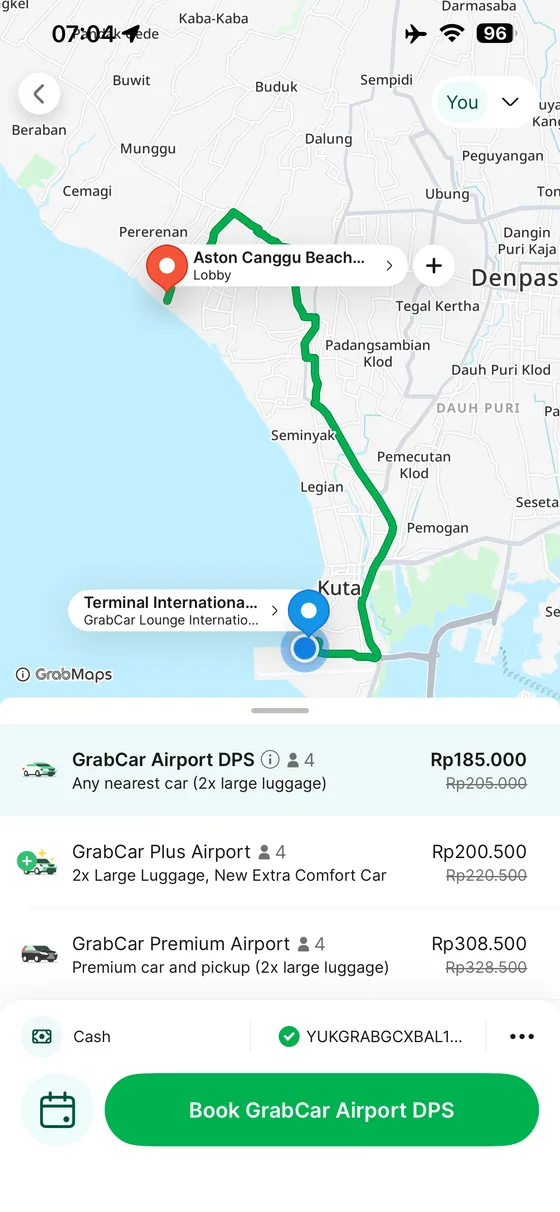 Grab app quote from Bali Airport to Aston Canggu showing GrabCar airport ride categories.