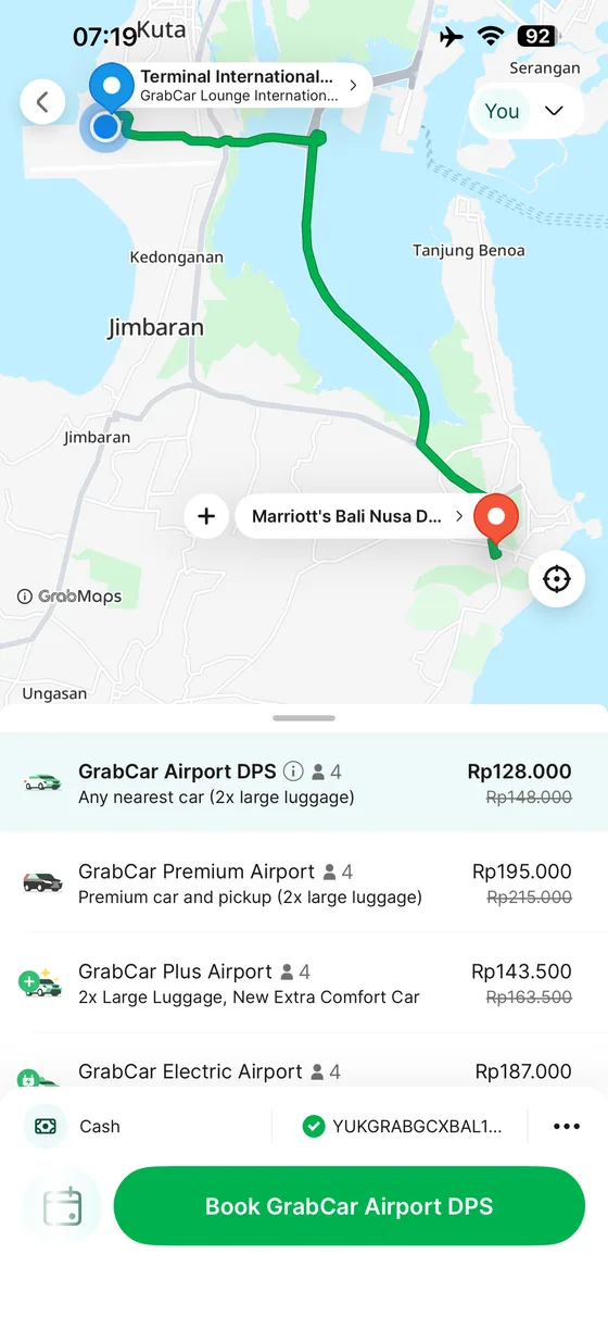 Grab app quote from Bali Airport to Marriott's Bali Nusa Dua Gardens showing airport ride categories.