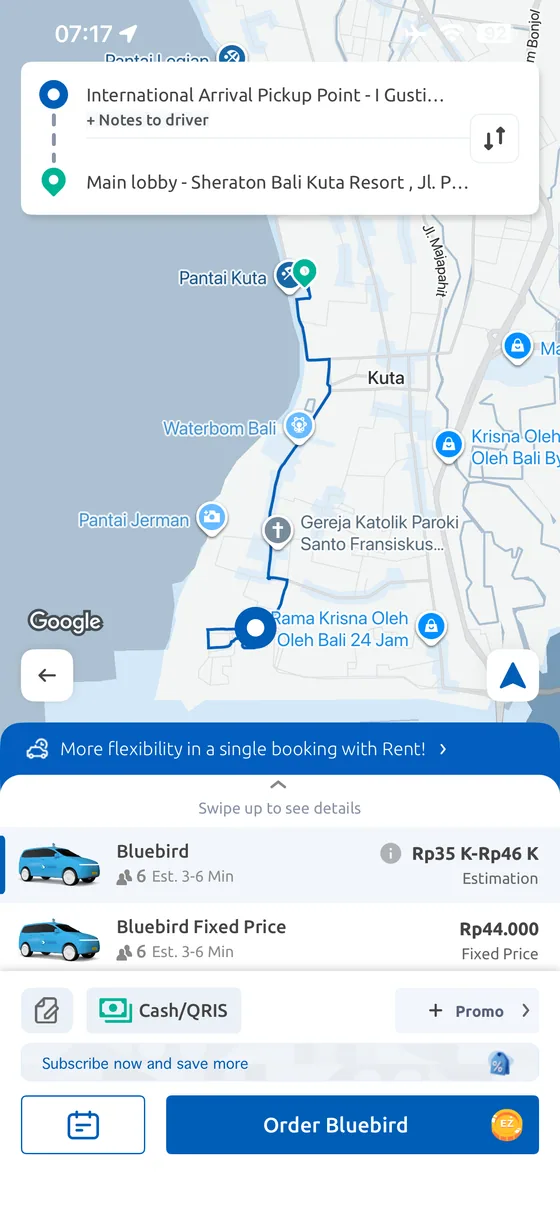MyBluebird app quote from Bali Airport to Sheraton Kuta showing estimated and fixed price options.