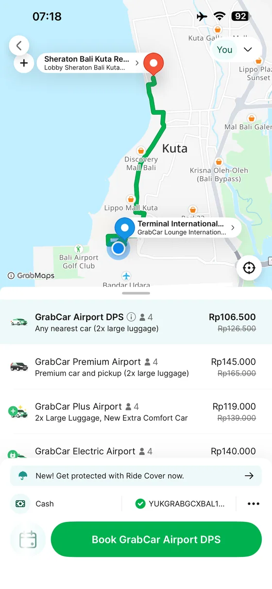 Grab app quote from Bali Airport to Sheraton Kuta showing airport ride categories.