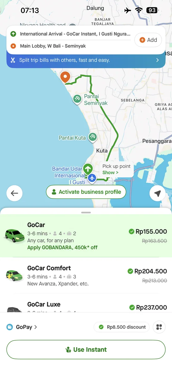 Gojek app quote from Bali Airport to W Seminyak showing GoCar, Comfort and Luxe options.