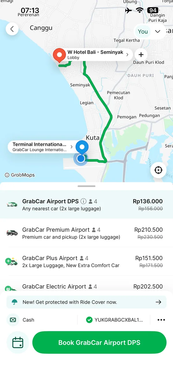 Grab app quote from Bali Airport to W Seminyak showing airport ride categories.